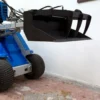 Oryginalna łyżka z chwytakiem o numerze katalogowym C890065, przystosowana do współpracy z ładowarkami marki MultiOne. Łyżka posiada szerokość roboczą 110 cm.
