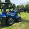 Oryginalna łyżka z chwytakiem o numerze katalogowym C890065, przystosowana do współpracy z ładowarkami marki MultiOne. Łyżka posiada szerokość roboczą 110 cm.